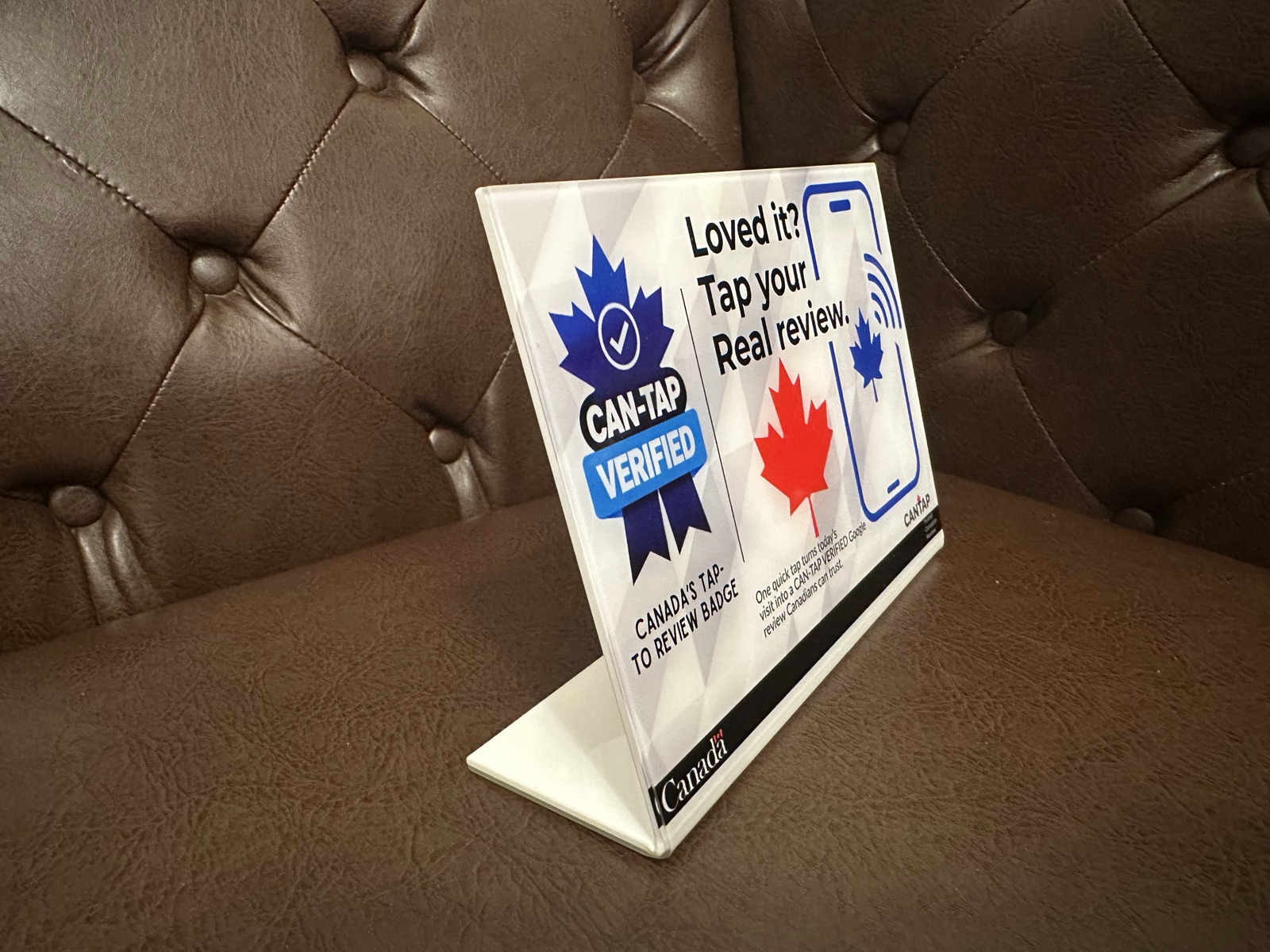 CAN-TAP Verified counter sign at angle showing weighted base